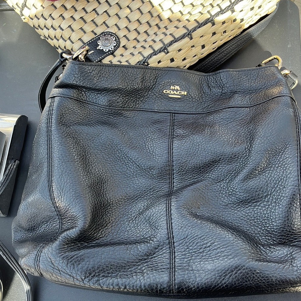 Coach Handbag- See 2 small white marks in pic 2. Discoloration on handles pic 3